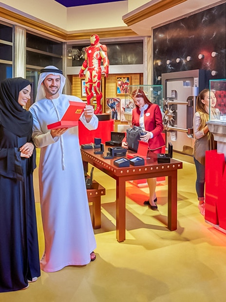 Visitors exploring Marvel exhibits at IMG Worlds of Adventure, Dubai.