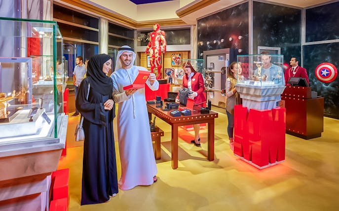 Visitors exploring Marvel exhibits at IMG Worlds of Adventure, Dubai.