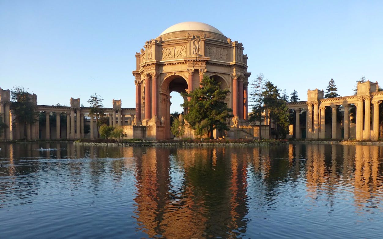Palace of Fine Arts in San Francisco reflecting on a pond, part of Hop-On Hop-Off Pass tour.