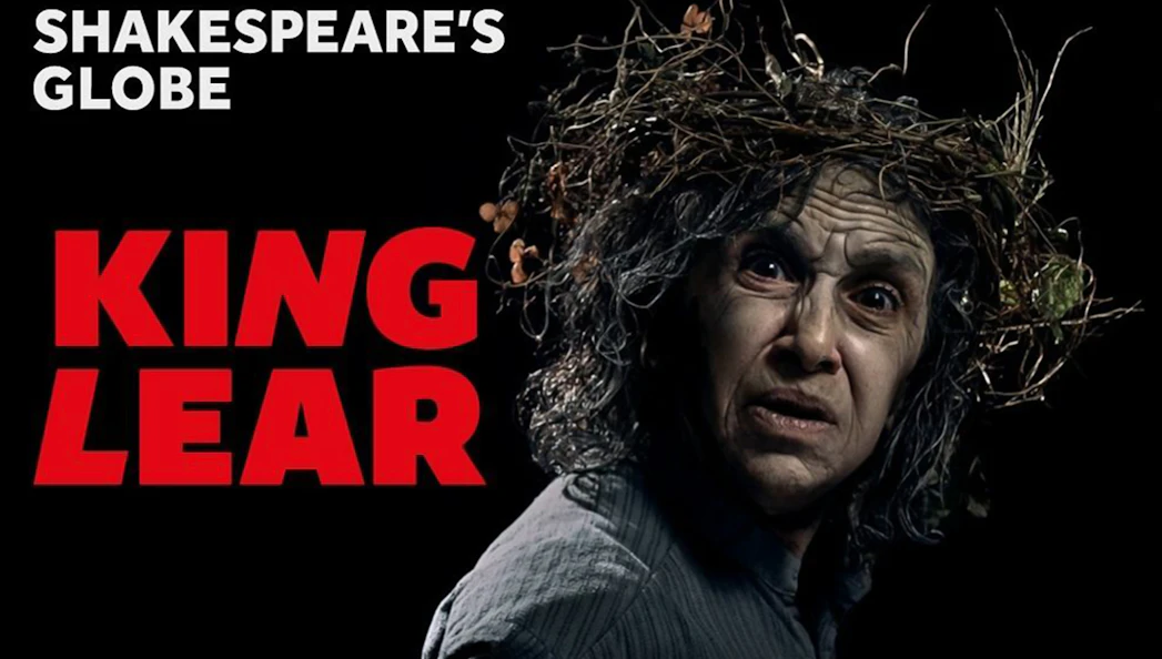 King Lear character with wild hair and intense expression at Shakespeare's Globe.