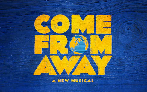 Come From Away musical logo with a globe on blue wood background
