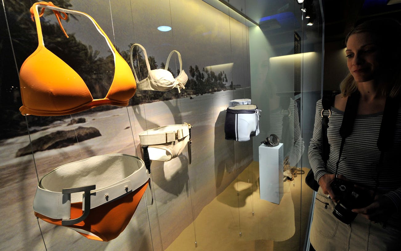 James Bond 007 exhibition display with iconic swimwear at Burj Khalifa, Levels 124 and 125.