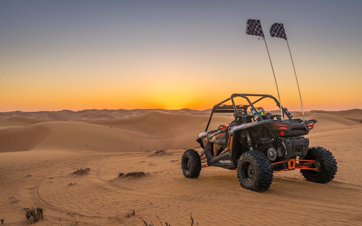 https://cdn-imgix.headout.com/tour/8410/TOUR-IMAGE/ed09e500-e538-4b2d-9beb-b6d947691a21-4949-dubai-evening-dune-buggy-safari-02.jpg?auto=compress&fm=pjpg&w=1200&h=750&crop=faces&fit=min