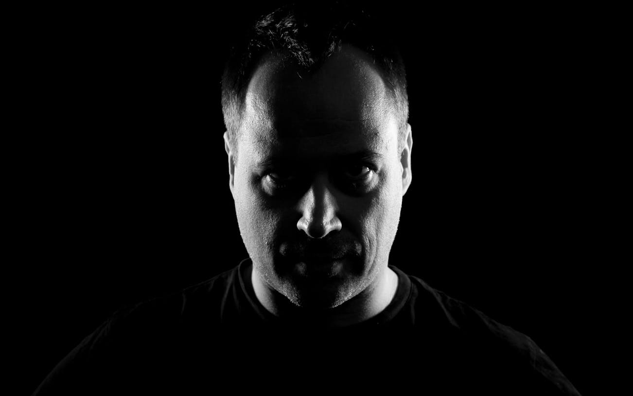 Shadowy figure in black and white for Dysfunktion 1st Birthday featuring Christian Smith event.