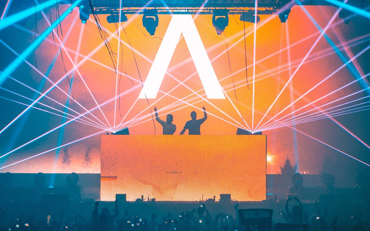 DJ duo performing with laser lights at Envie Events NYE 2017 concert.