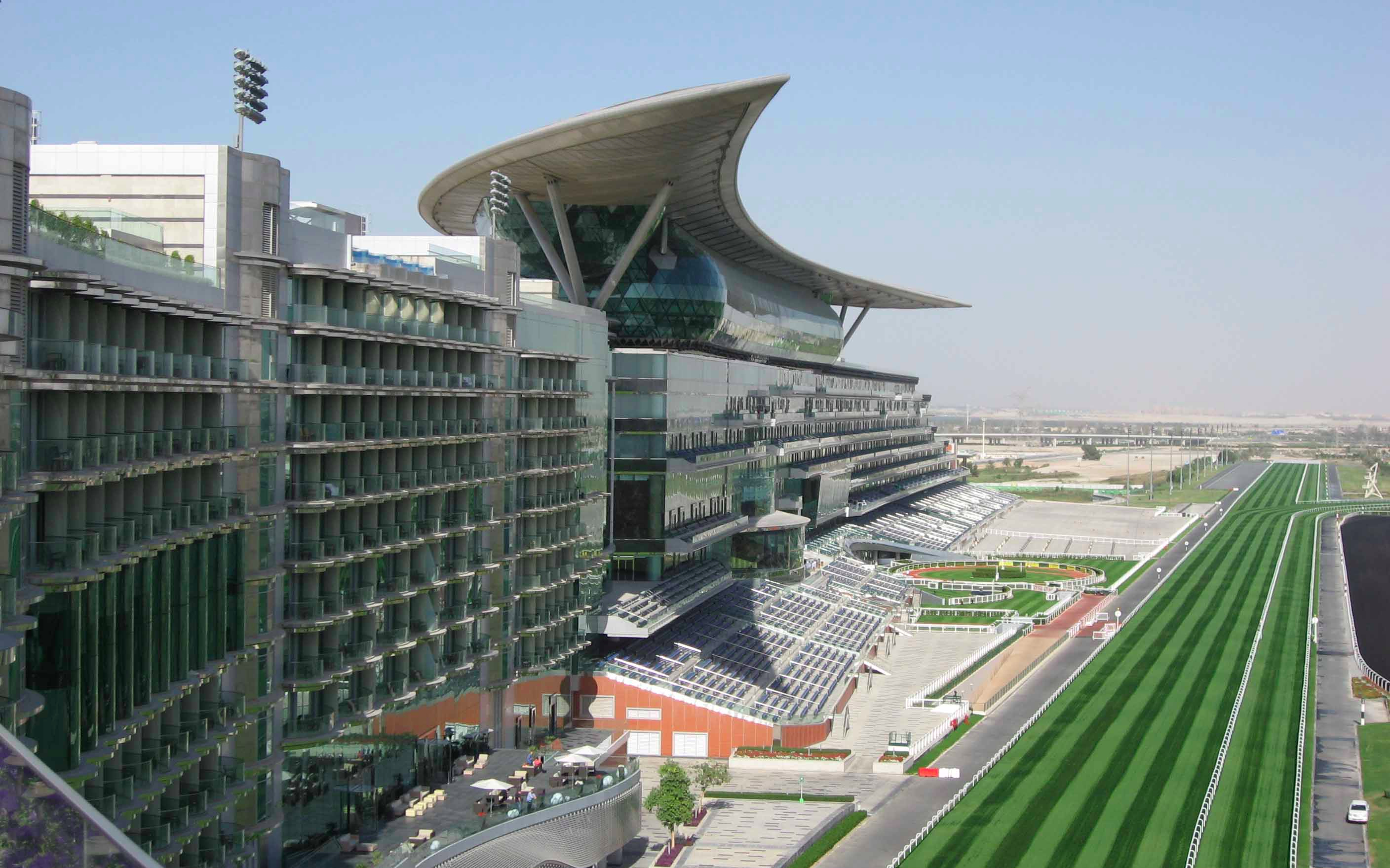 Meydan Racecourse grandstand and track in Dubai, UAE.