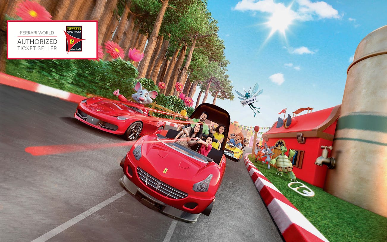Family enjoying a ride at Ferrari World Abu Dhabi with cartoon characters and vibrant scenery.