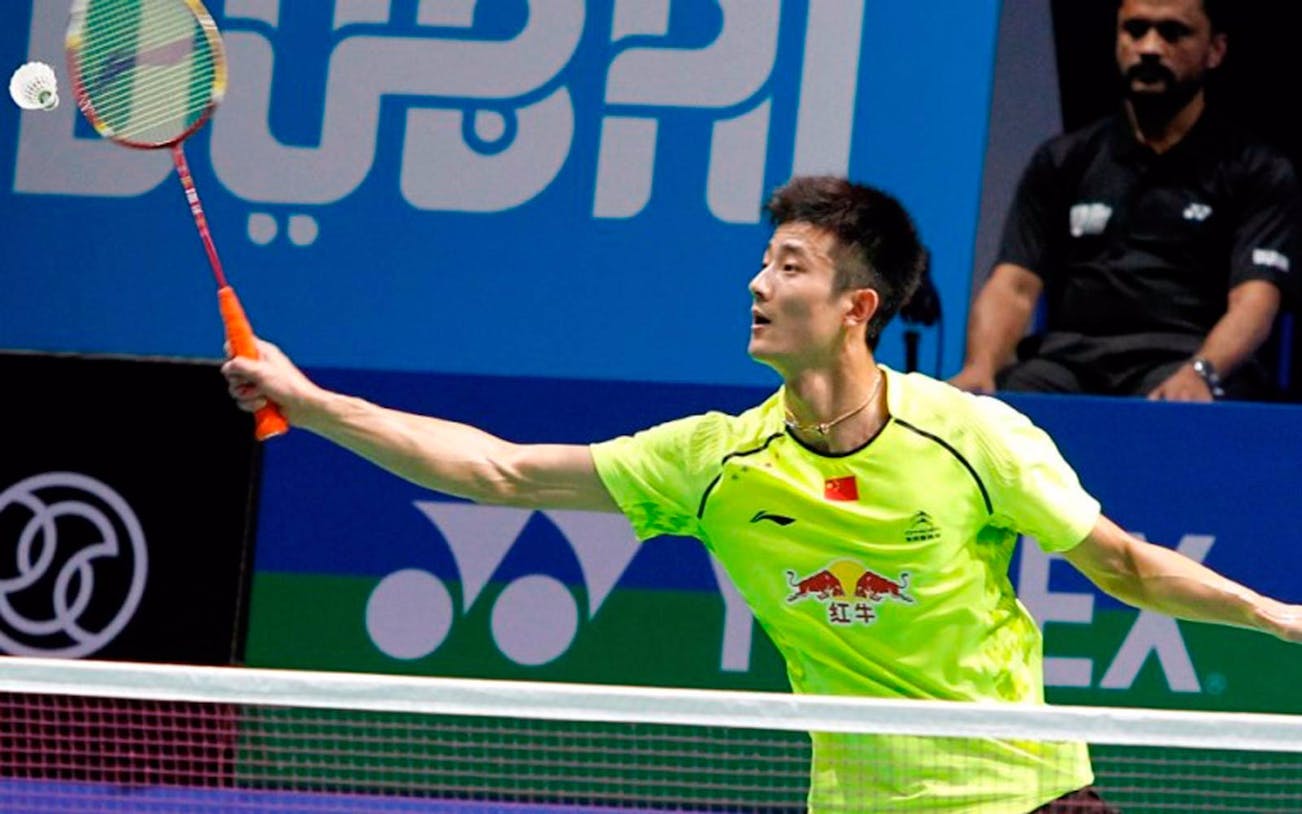 Badminton player in action at Dubai World Superseries Finals.