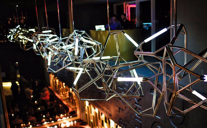 Geometric light fixtures at Fifty Shades of Gold New Year's Eve Party venue.