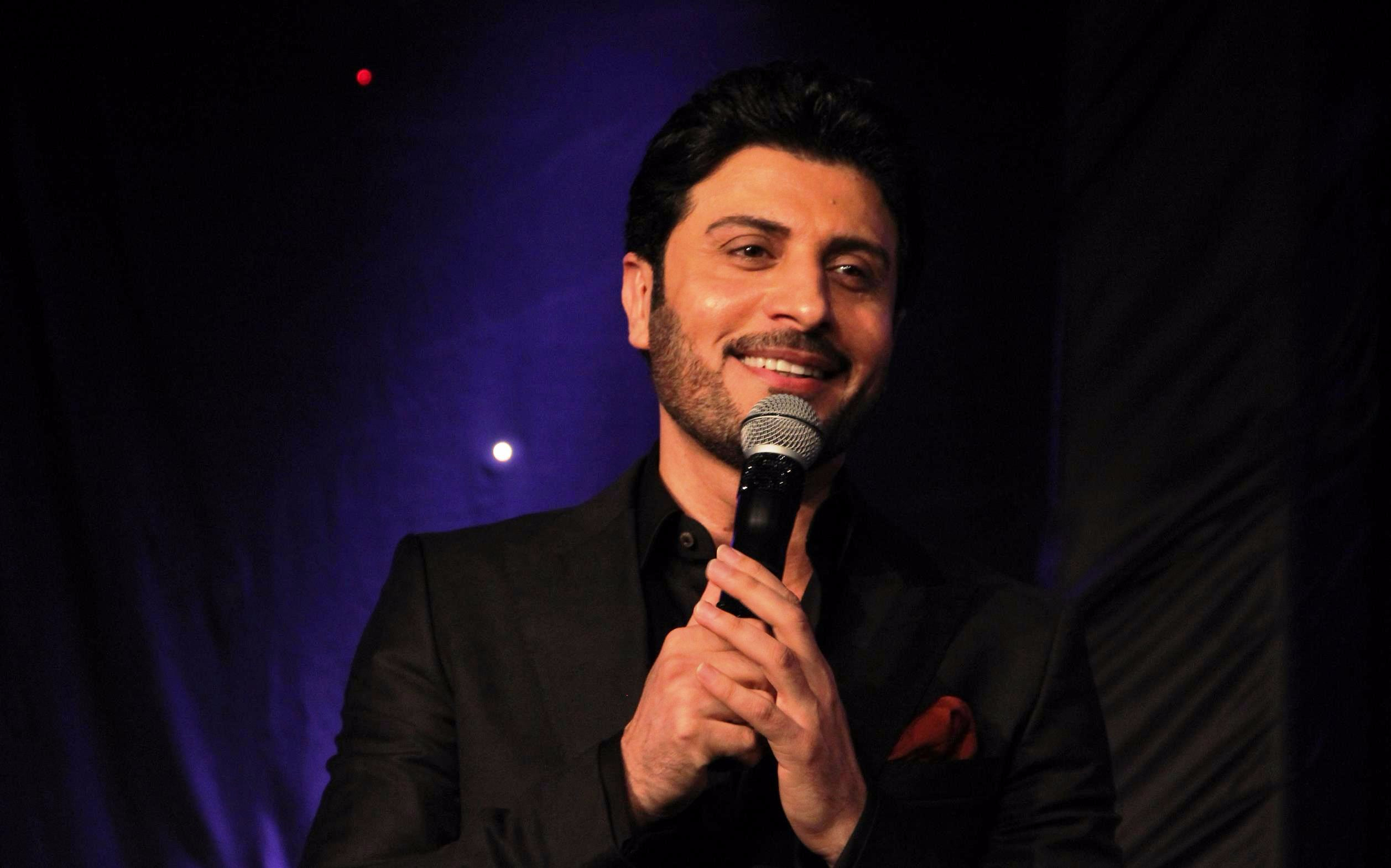 Singer performing at Majid Al Muhandis, Sherine & Fares Karam Concert.