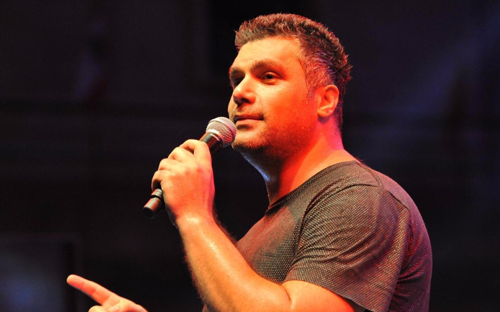 Singer performing at Majid Al Muhandis, Sherine & Fares Karam Concert.