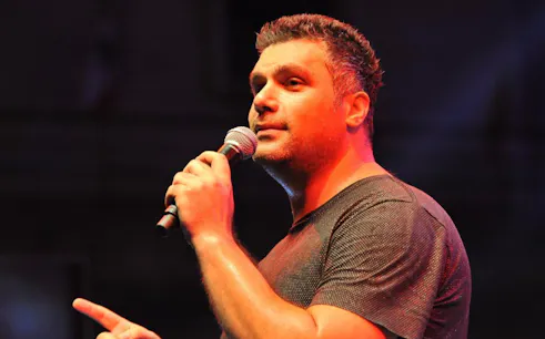 Singer performing at Majid Al Muhandis, Sherine & Fares Karam Concert.