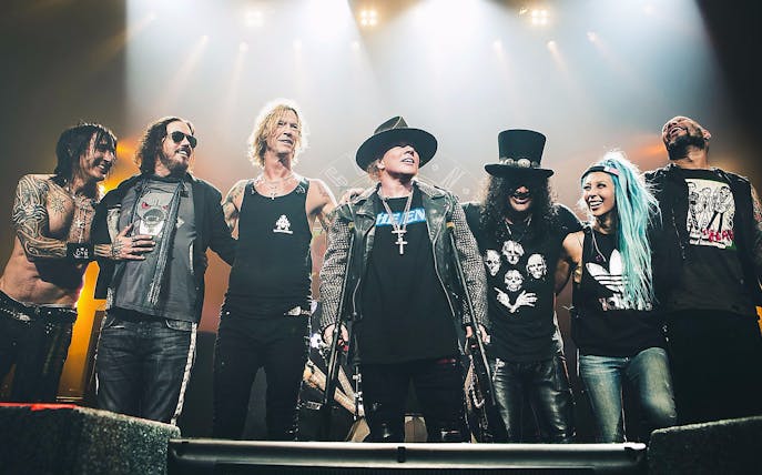 Band members on stage during Guns N' Roses live concert in Dubai.
