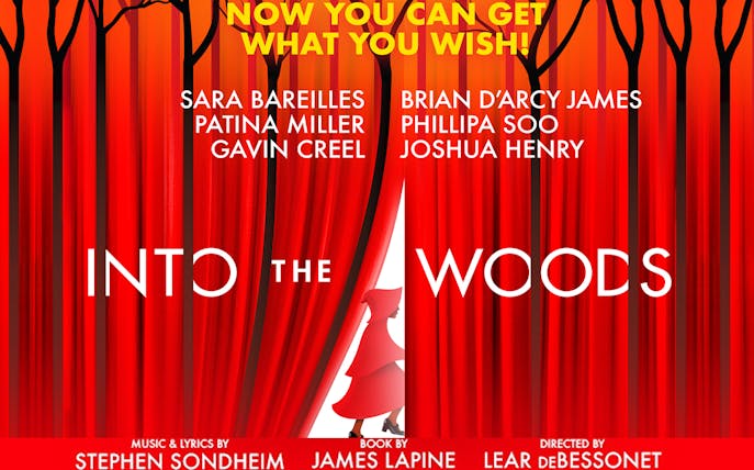 Into The Woods musical poster with red curtains and cast names.